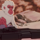 A Japanese macaque reaches for a gun in the snow in a scene from Marvel animated series Hit-Monkey.